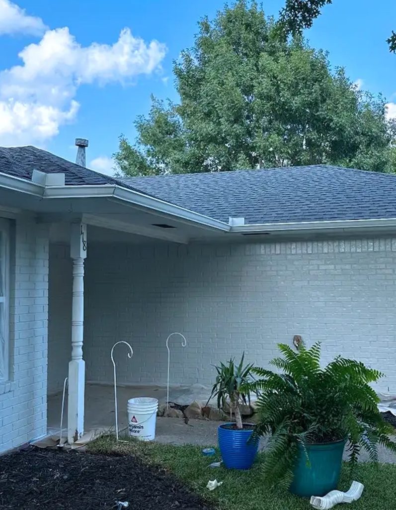 Brick home in Waxahachie, TX painted white
